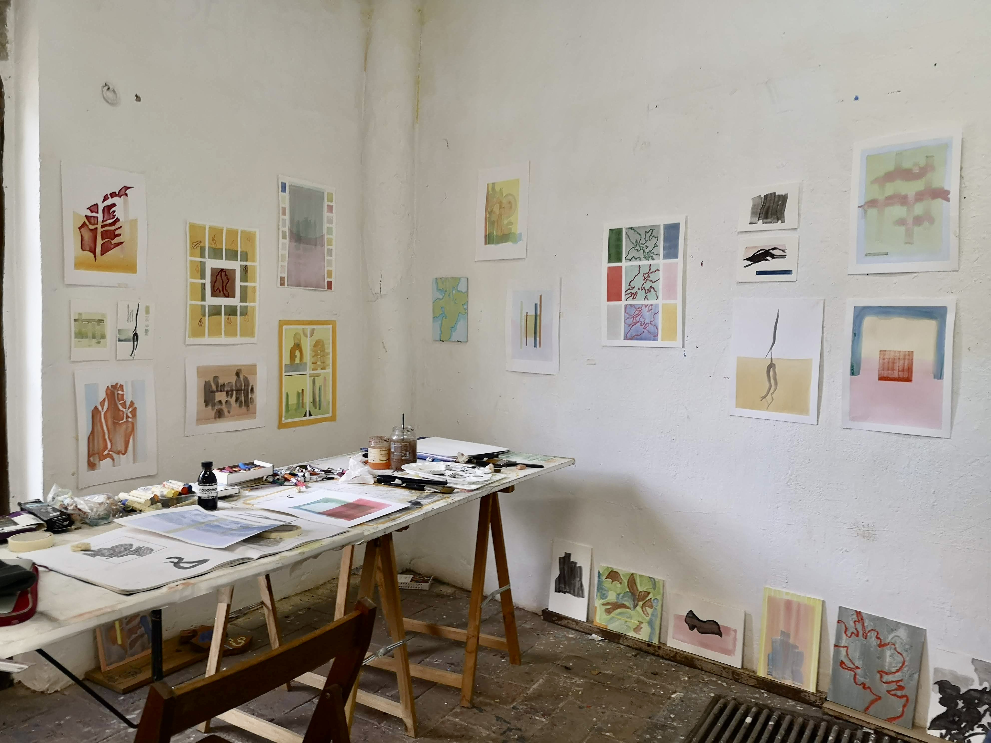 Studio walls hung with works on paper at Can Serrat, Catalonia, 2021.